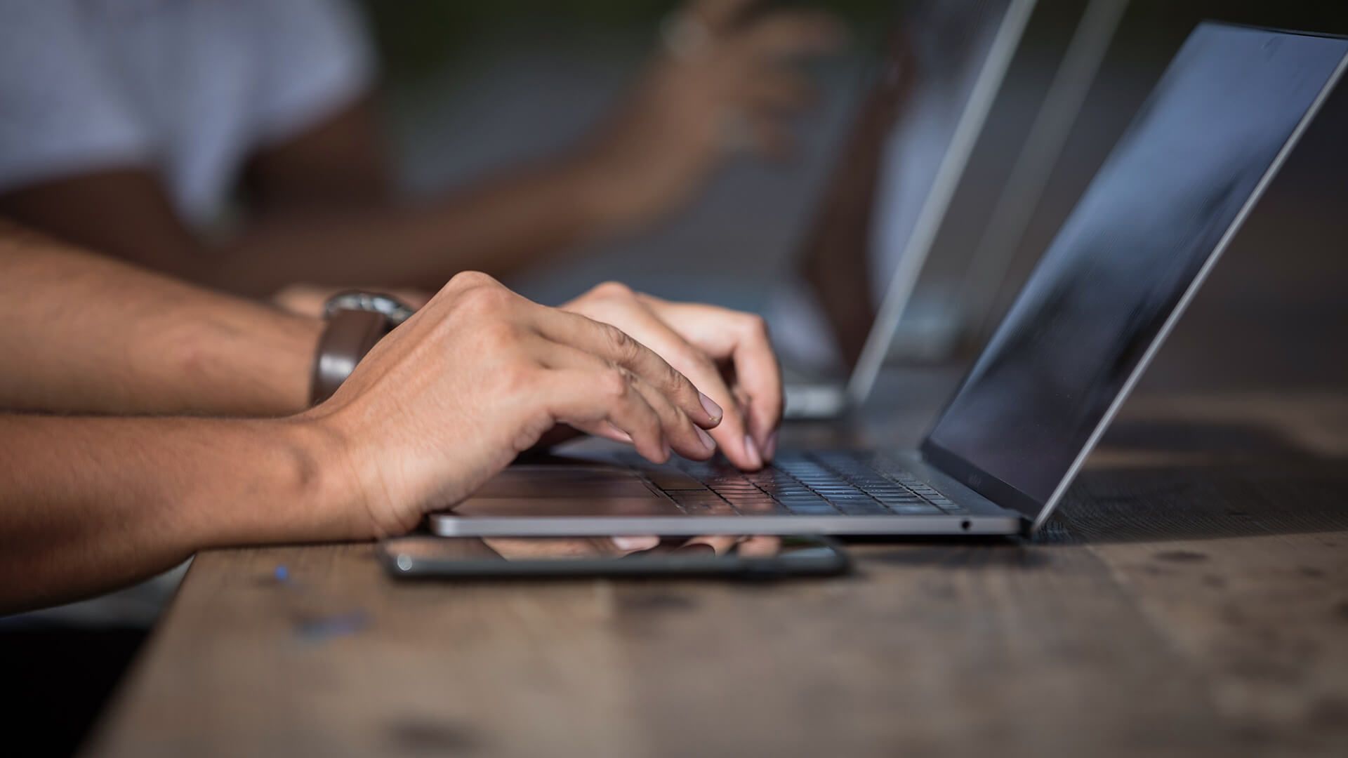 Typing-on-laptop-closeup-Img